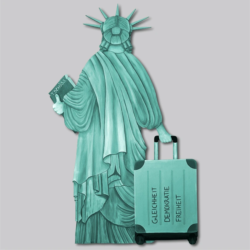 freiheitsstatue-von-hinten-mit-koffer